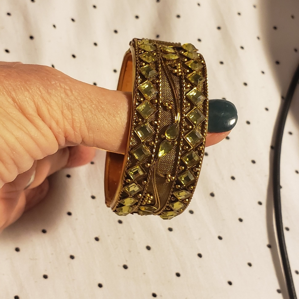 Peridot looking stones and gold hinged bangled bracelet